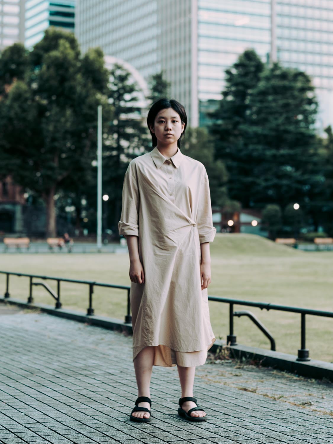 a girl on the stone pavement