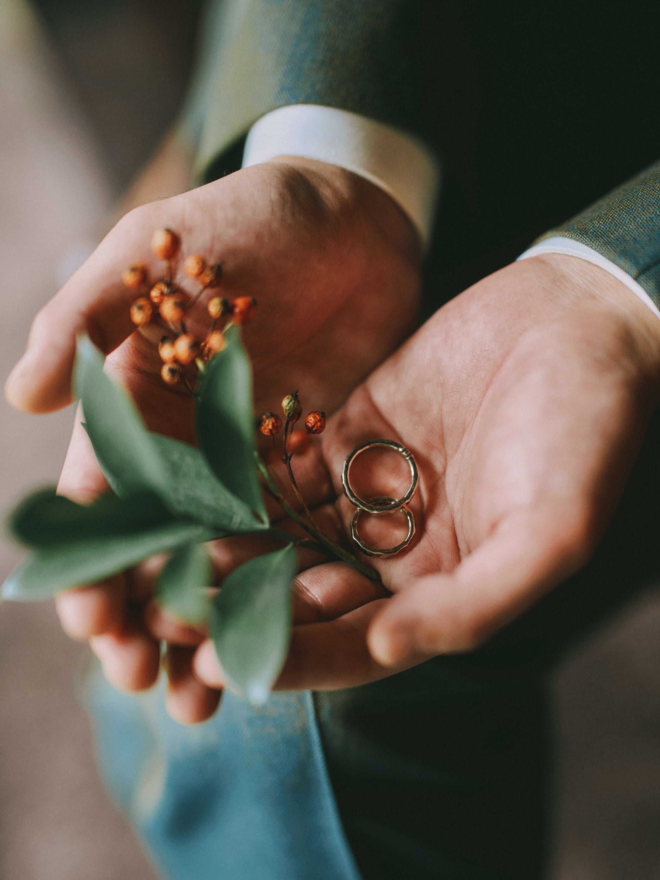 wedding rings with red berries