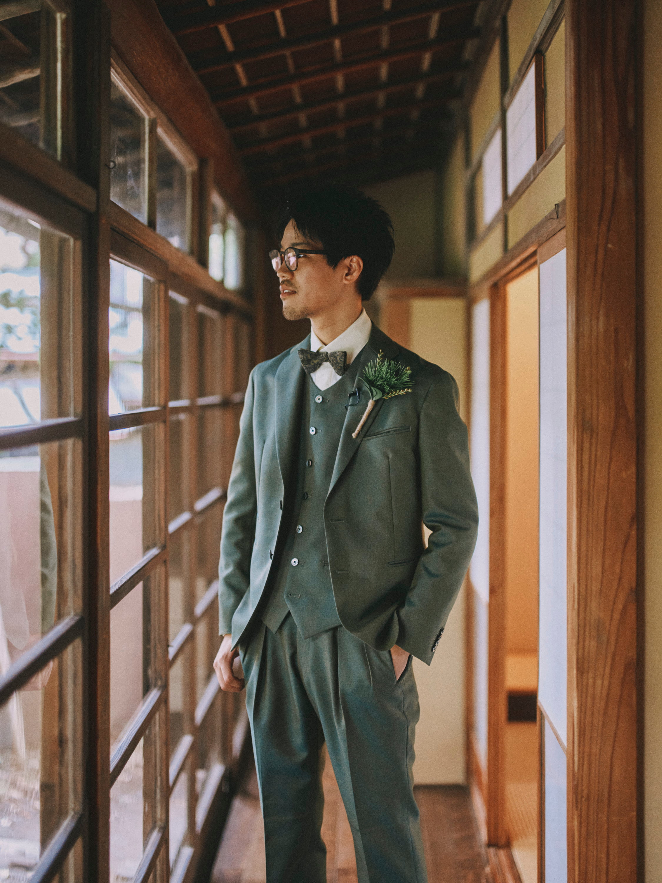 groom standing in the hallway