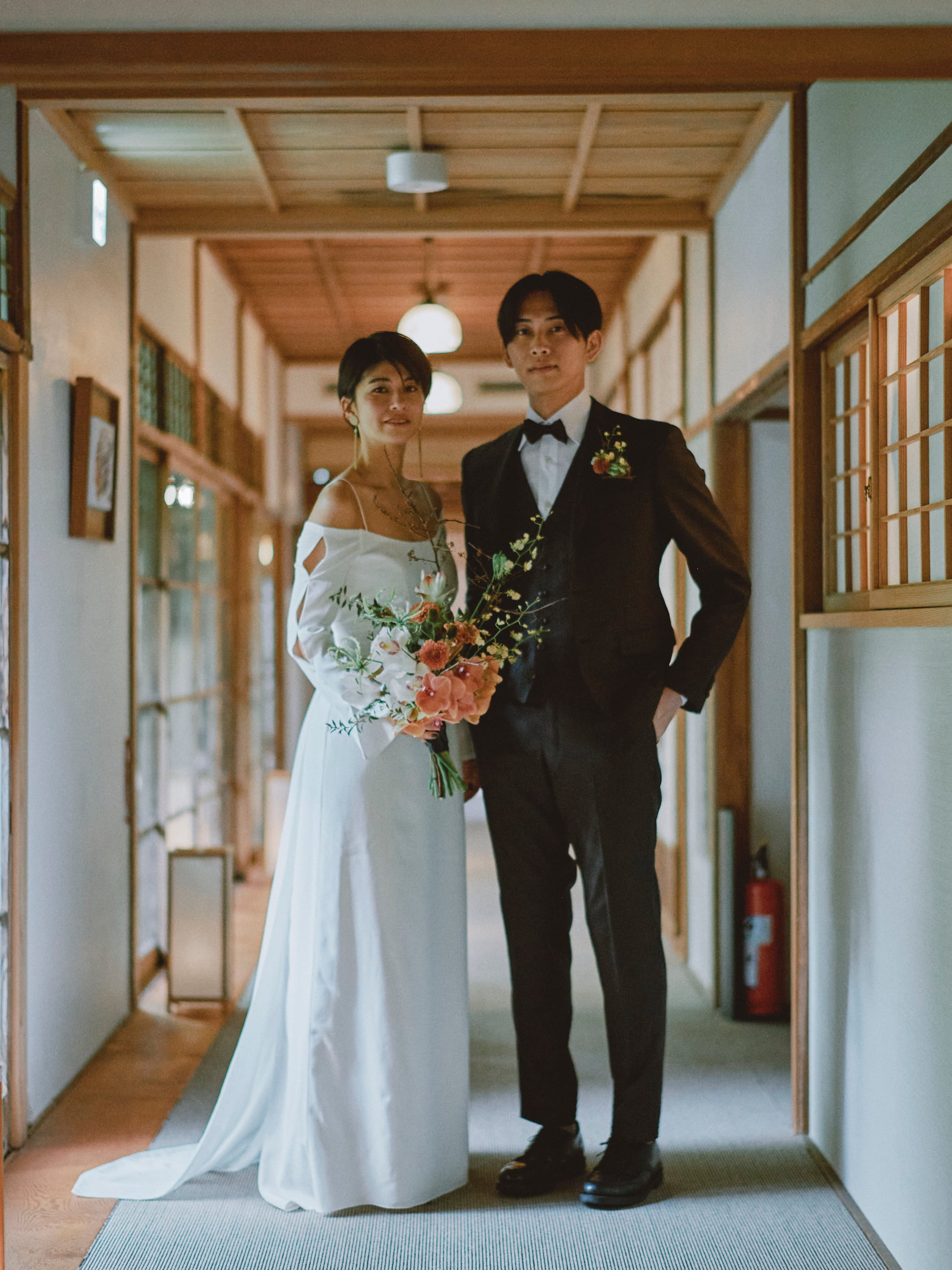 Bride and groom in the hallway