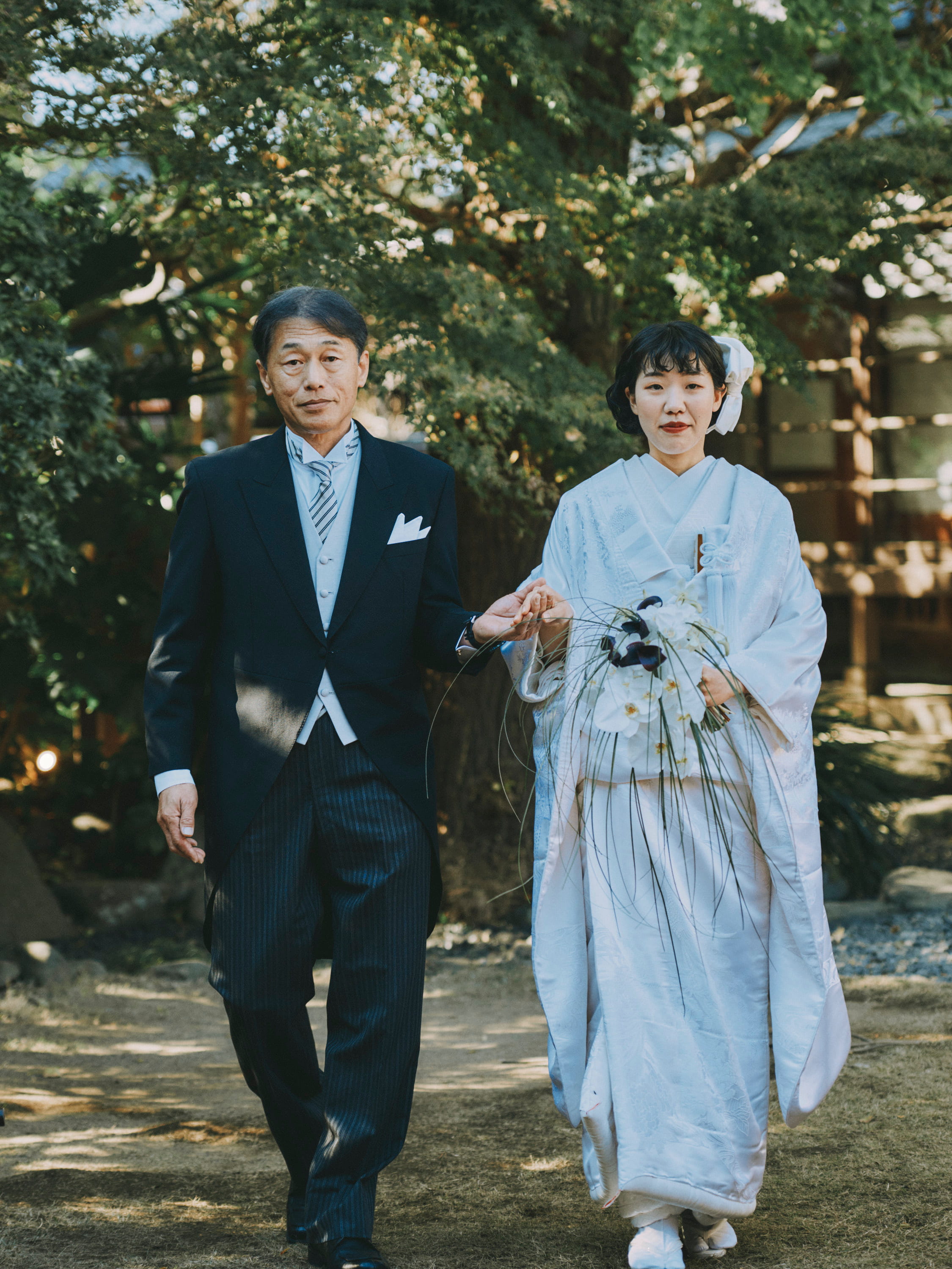 bride in kimono with her dad